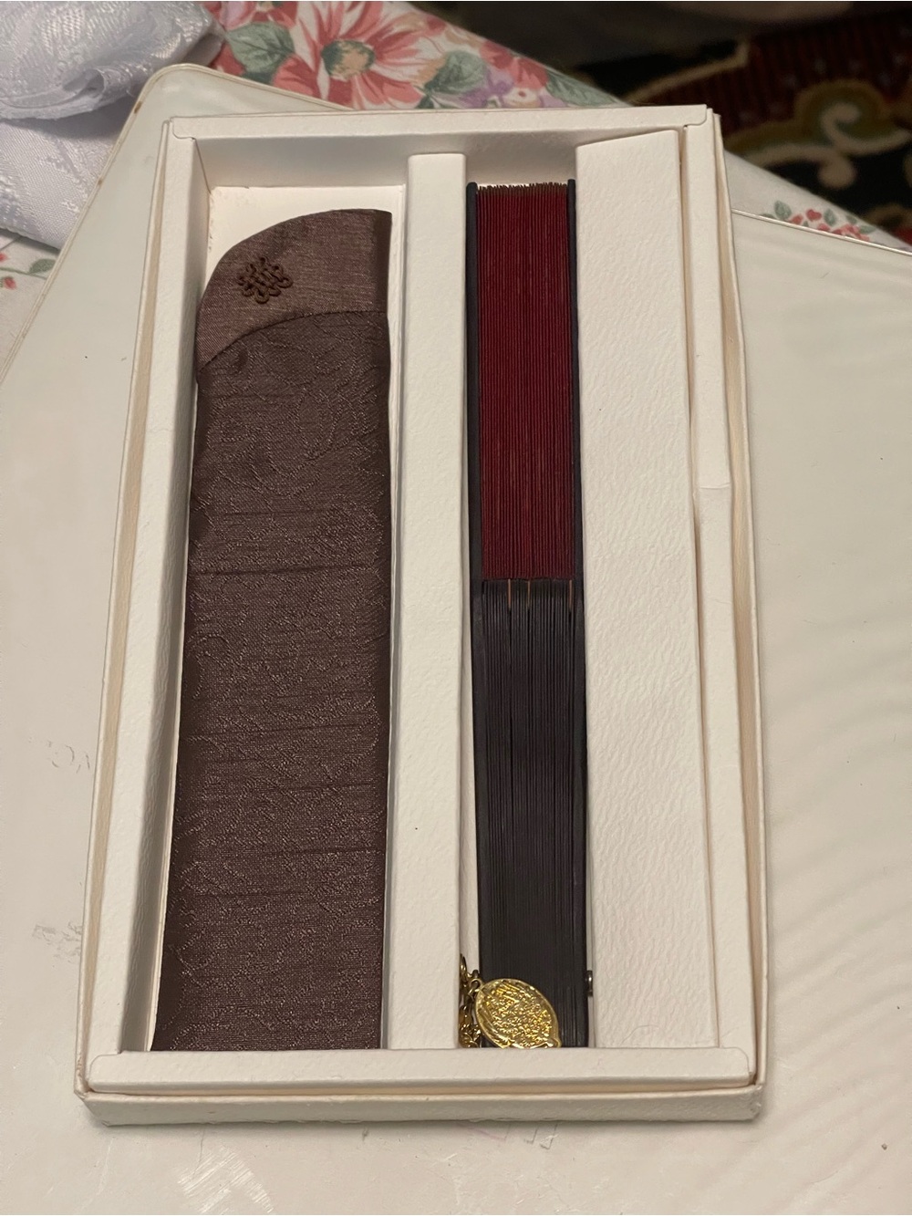 Elegant Folding Hand Fan with Brown Sleeve and Red-Brown Staves
